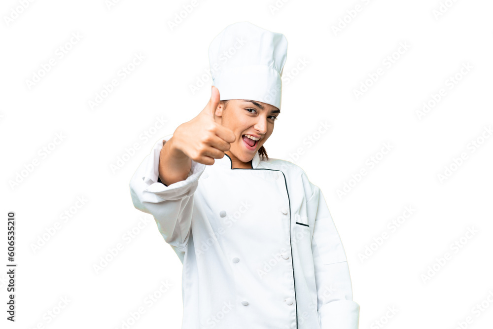 Young woman Chef over isolated chroma key background with thumbs up because something good has happened Young woman Chef over isolated chroma key background with thumbs up because something good has happened