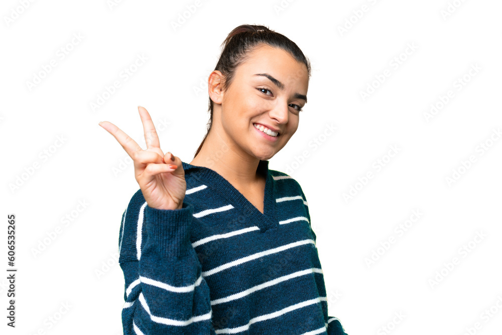 Young beauty woman over isolated chroma key background smiling and showing victory sign Young beauty woman over isolated chroma key background smiling and showing victory sign