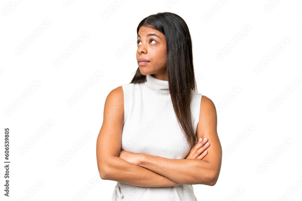 Young African american woman over isolated background looking to the side Young African american woman over isolated background looking to the side