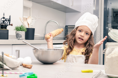 Junior Baker: Girl Mastering the Art of Pastry Making in the Kitchen