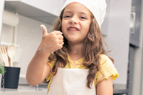 Junior Pastry Chef: Girl Embracing the Delightful World of Cookie Making