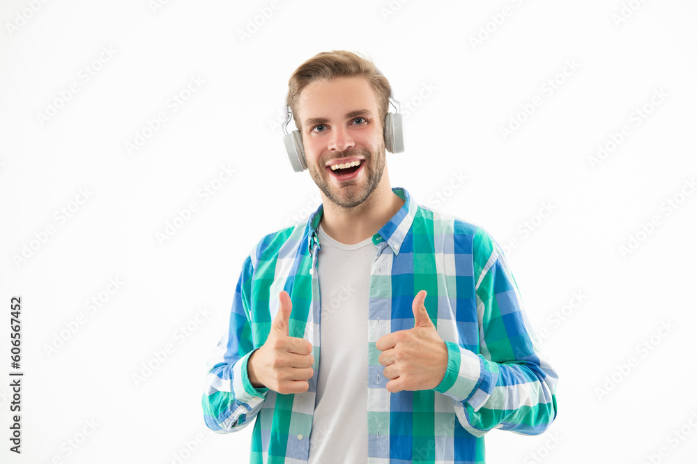 millennial man wear music headphones in studio, thumb up. millennial man listening music millennial man wear music headphones in studio, thumb up. millennial man listening music
