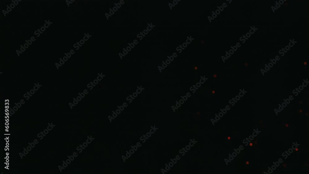 Heated embers VFX fire element sparks fly through the frame in a captivating slow-motion 4K—the mesmerising beauty of fire particles and flying embers against a black screen. Heated embers VFX fire element sparks fly through the frame in a captivating slow-motion 4K—the mesmerising beauty of fire particles and flying embers against a black screen.