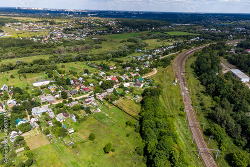 Aerial view of Shemyakino village and railway station, Kaluzhskiy region, Russia photo