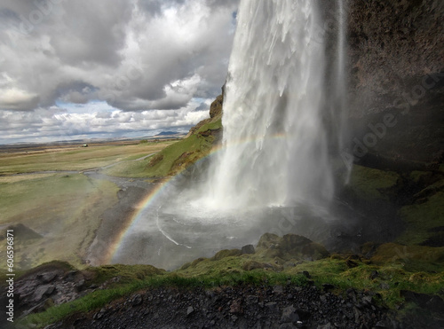 Waterfall with a rainbow in the foreground in Iceland 