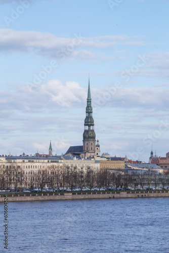 Beautiful view of St. Peter's Cathedral across the Daugava River in Riga, Latvia