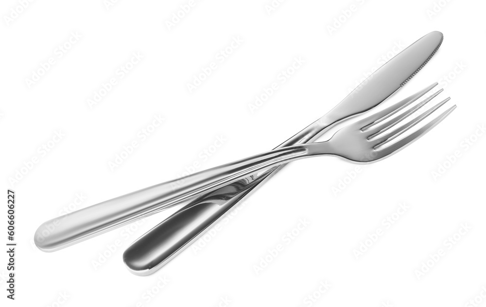 Fork and knife isolated on white. Stylish shiny cutlery set Fork and knife isolated on white. Stylish shiny cutlery set