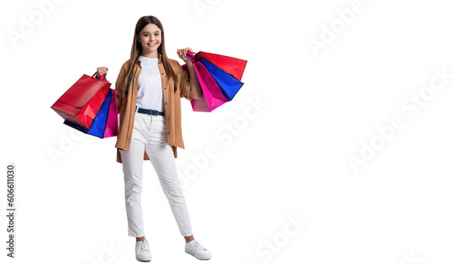 teen girl shopaholic hold bags on background. photo of teen girl shopaholic with bags. teen girl shopaholic isolated on white. teen girl shopaholic in studio.