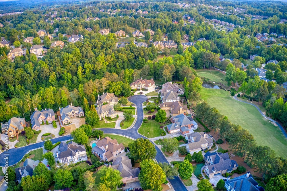 Obraz premium Aerial panoramic view of an upscale subdivision shot during golden hour