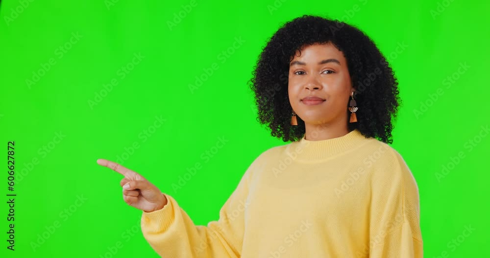 Woman, pointing finger and portrait on green screen for advertising space, announcement or promotion. African female person on studio background with hands for mockup, information list or choice Woman, pointing finger and portrait on green screen for advertising space, announcement or promotion. African female person on studio background with hands for mockup, information list or choice