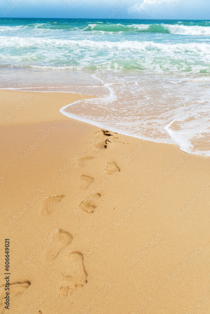 human footprints on the sea sand human footprints on the sea sand