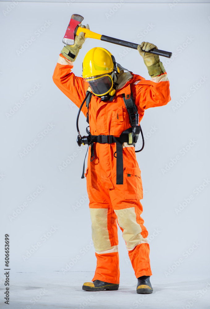 On a white background the firefighter stands gripping an iron axe with unwavering strength his gaze is directed downward, focused on the floor as he the axe securely atop it. On a white background the firefighter stands gripping an iron axe with unwavering strength his gaze is directed downward, focused on the floor as he the axe securely atop it.