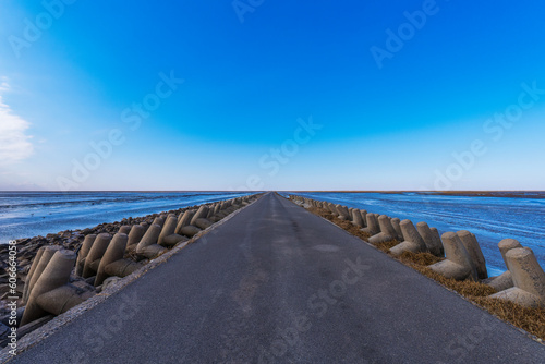The road in the sea leads to the sky © guoquan