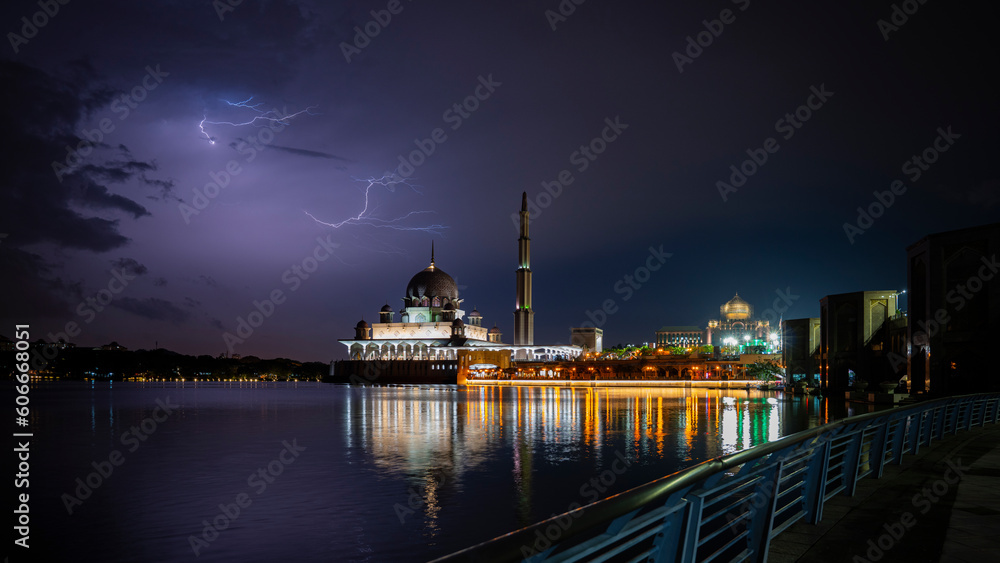 Lightning strikes during thunder storm over Putrajaya Putra Mosque at night
