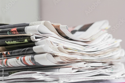 Pile of old newspapers, selective focus. Copy space © PanArt