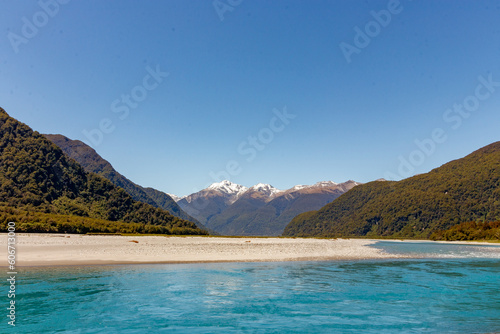 River Bed the Haast Pass, New Zealand, with snow-capped mountains