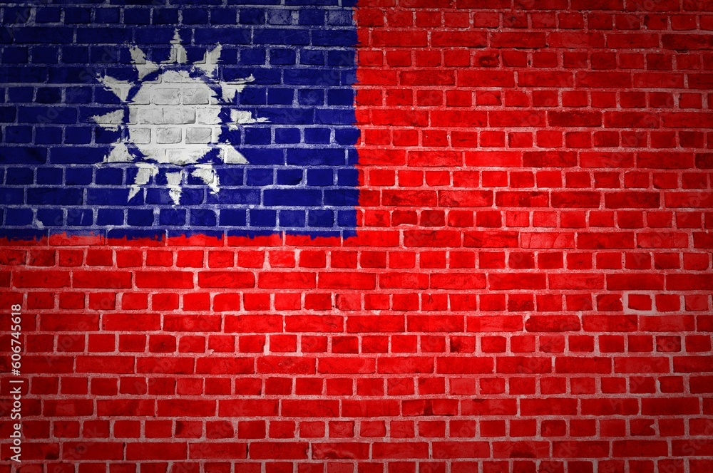 Shot of the Taiwan flag painted on a brick wall in an urban location Shot of the Taiwan flag painted on a brick wall in an urban location
