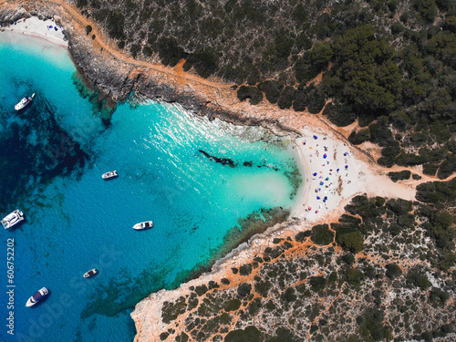 Beautiful drone view of the beach Cala Varques with boats on Mallorca