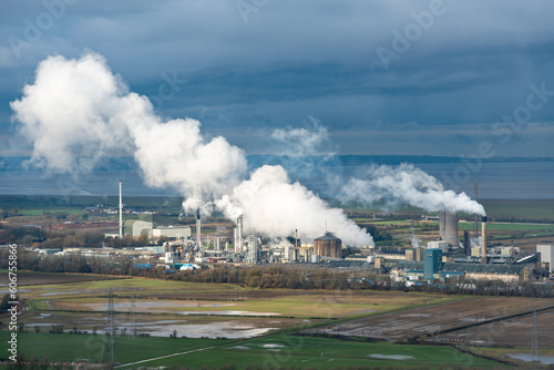 Wallpaper Mural Daylight shot of a factory with smoke, the concept of pollution Torontodigital.ca