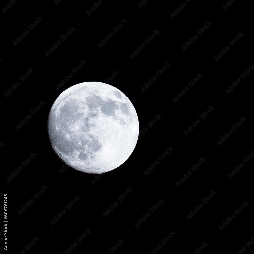 Low angle closeup shot of the bright moon at night Low angle closeup shot of the bright moon at night