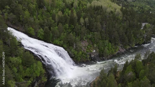 Drone view over the giant waterfall in Geiranger fjord, Norway - slow motion photo
