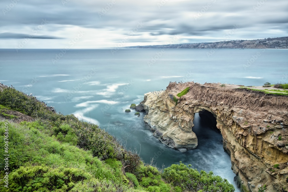Beautiful view of the cliffs and sea on a cloudy day. La Jolla, California.
