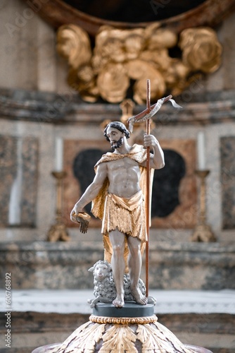 Vertical shot of a religious statue inside the St. Lorenz Basilica in Kempten  Bavaria  Germany