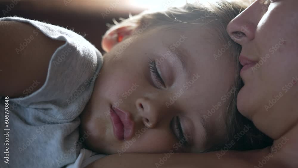 Small boy napping closeup macro face. Child asleep with mother Small boy napping closeup macro face. Child asleep with mother