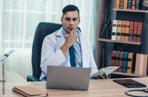 Physician conducts online, distant consultations via video call. Taking medical histories, dealing with patient's concerns, answering queries. Creating a treatment plan and prescribing medications.