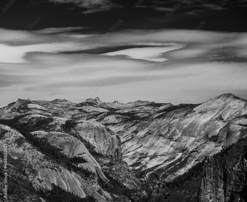 Clouds Smear Across The Sky Over The Bright Granite of Yosemite
