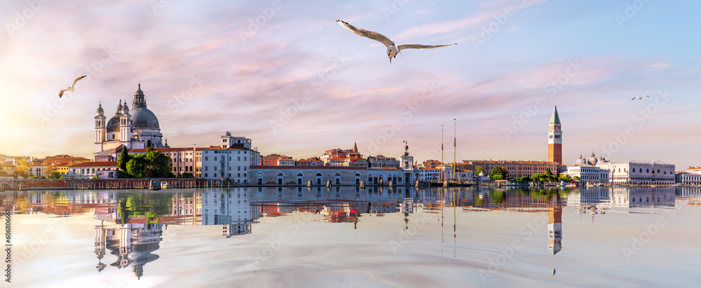 San Marco and Doge's Palace in the Venice lagoon at sunset, panoramic view, Italy