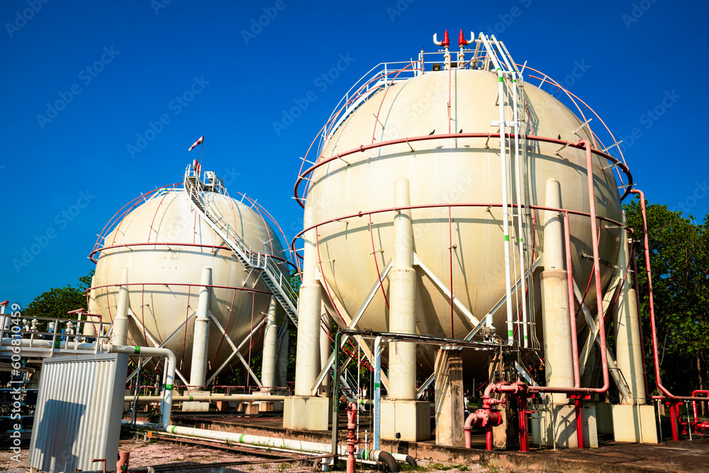 White spherical propane tanks containing fuel gas White spherical propane tanks containing fuel gas