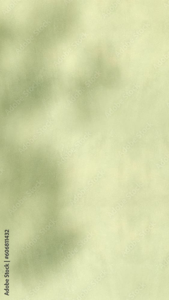 Vertical shadow of tree leaves in the wind on green texture background, backdrop for reel, stories Vertical shadow of tree leaves in the wind on green texture background, backdrop for reel, stories