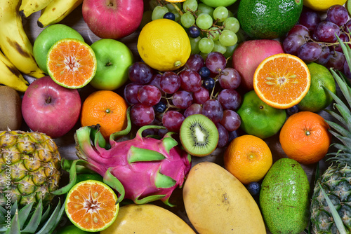 Fototapeta Naklejka Na Ścianę i Meble -  assorted fruits, top view healthy food concept Including high vitamin fruits, fresh fruits, thai fruits
