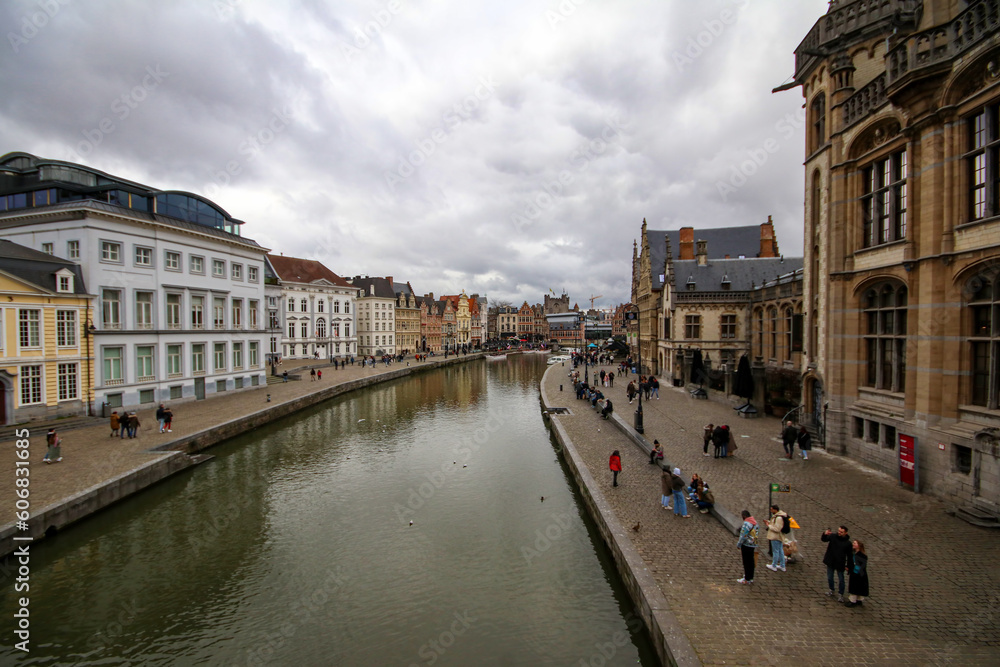 View of Graslei pier and Leie river in the historic city center of Ghent (Gent), Belgium. Ghent architecture and landmark. Ghent City Landscape.