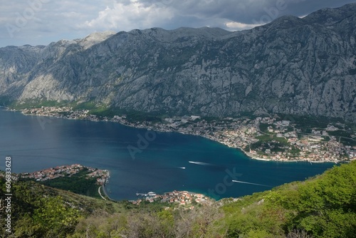 View of Bay of Kotor and towns on coast from tourist rail on Vrmac Peninsula  with the highest peak Sveti Ilija. Montenegro  Balkans