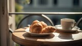 Balcony View of a Cup of Coffee and French Croissaints