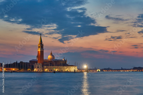 Scenic view of St George Church and Island in the Giudecca Canal, as seen at night from St Mark's district in Venice