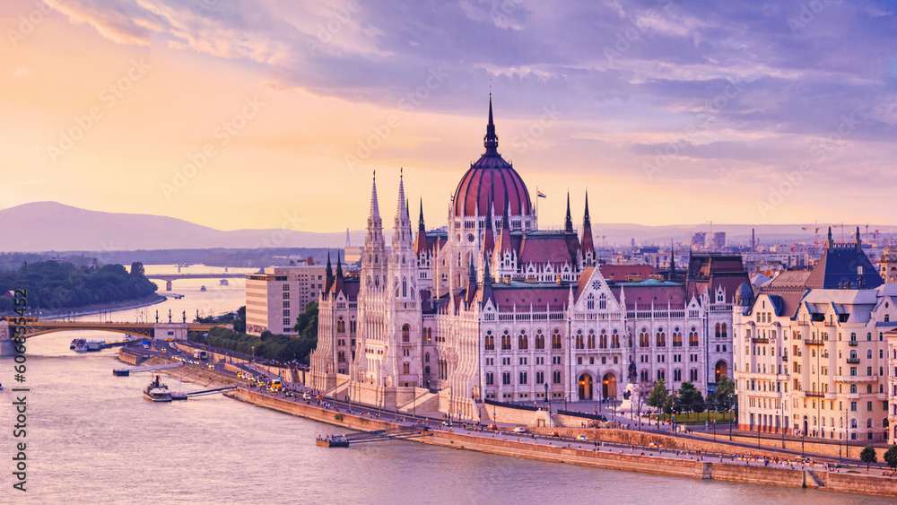 City summer landscape at sunset - view of the Hungarian Parliament Building and Danube river in the historical center of Budapest, Hungary