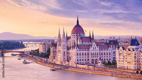 City summer landscape at sunset - view of the Hungarian Parliament Building and Danube river in the historical center of Budapest, Hungary © rustamank