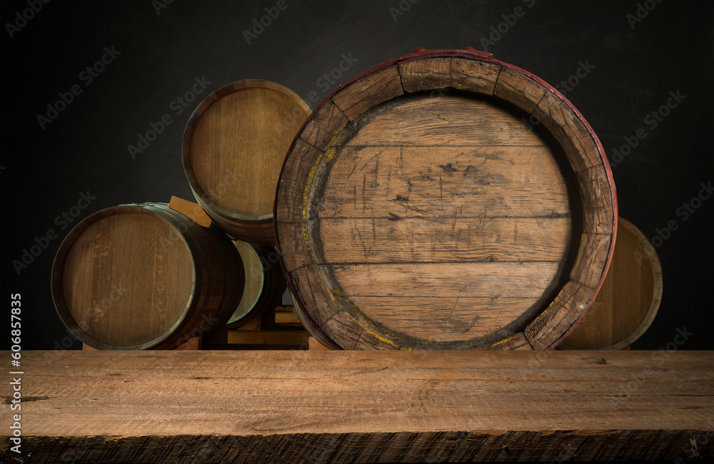 Wine casks at the winery. Stacked Wine barrels at the german winery. High quality photo Wine casks at the winery. Stacked Wine barrels at the german winery. High quality photo