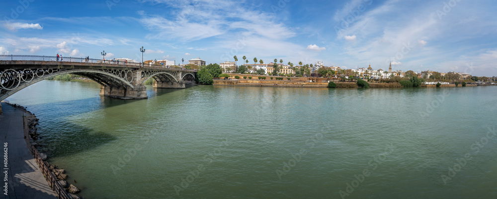 Panoramic view of Guadalquivir River with Triana Bridge (Puente de Triana)  - Seville, Andalusia, Spain