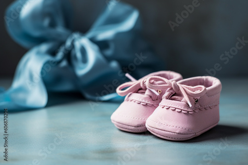 Pair of pink baby shoes. Generative AI illustration