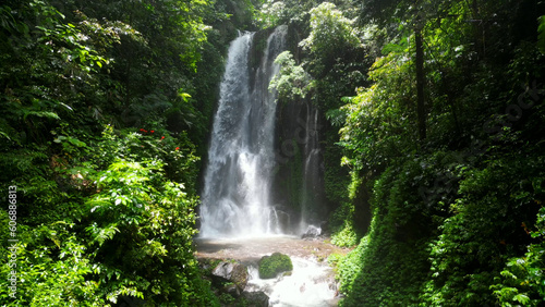 Labuhan Kebo waterfall. Labuhan Kebo waterfall is a beautiful multi tier stream situated in a lush green valley. 