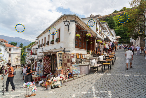 Gjirokastra, Albania - September, 2021: Souvenir shops in old town of Gjirokaster in Albania. Old town of Gjirokaster is a World Heritage Site by UNESCO