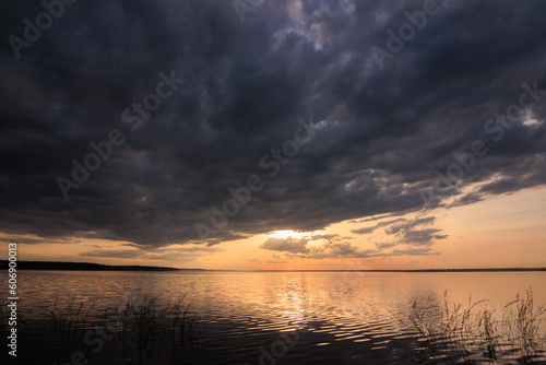 Evening landscape  sunrise or sunset on the lake or the sea