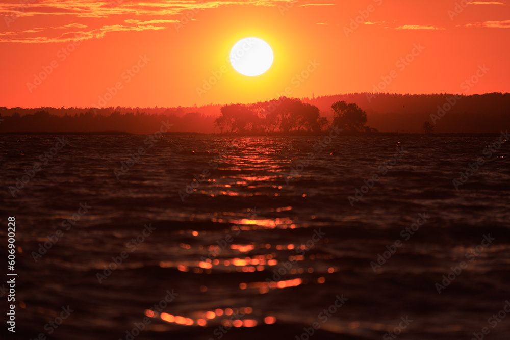 Evening landscape, sunrise or sunset on the lake or the sea Evening landscape, sunrise or sunset on the lake or the sea