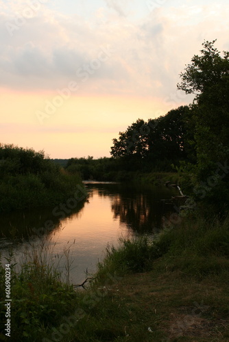 Fototapeta Naklejka Na Ścianę i Meble -  Evening landscape, sunrise or sunset on the lake or the sea