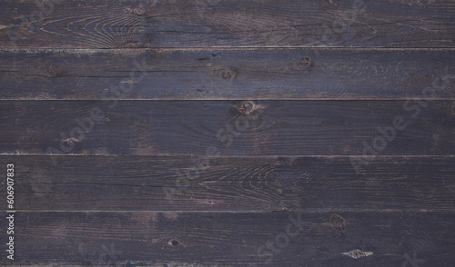 Dark brown wood table top texture background