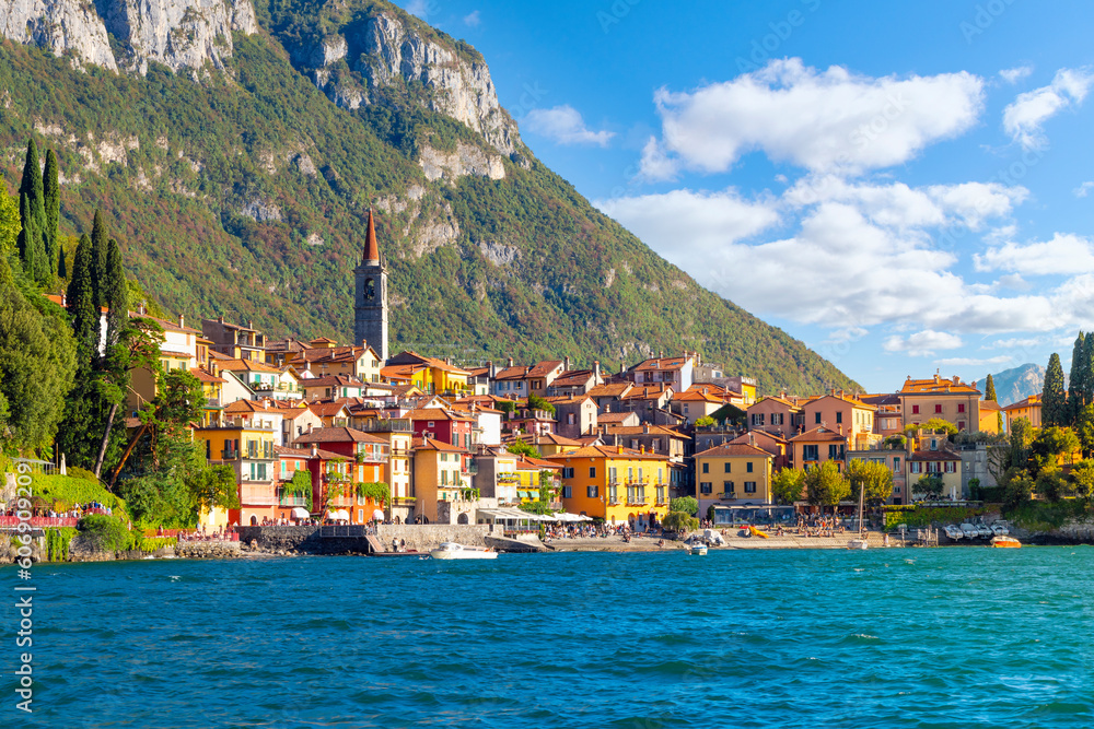 The skyline and beach of the colorful Italian lakefront resort village of Varenna, Italy at summer on the shores of Lake Como.